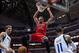 Feb 28, 2014; Dallas, TX, USA; Chicago Bulls center Joakim Noah (13) dunks the ball as Dallas Mavericks power forward Dirk Nowitzki (41) and shooting guard Monta Ellis (11) look on during the second half at the American Airlines Center. The Bulls defeated