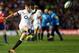 Kicking for glory: England's Owen Farrell.