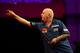 LONDON, ENGLAND - DECEMBER 14: Robert Thornton of Scotland in action during his first round match against Max Hopp of Germany during the Ladbrokes.com World Darts Championship on Day Two at Alexandra Palace on December 14, 2013 in London, England. (Photo
