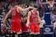 Feb 28, 2014; Dallas, TX, USA; Chicago Bulls center Joakim Noah (13) and shooting guard Kirk Hinrich (12) celebrate the win over the Dallas Mavericks at the American Airlines Center. The Bulls defeated the Mavericks 100-91. Mandatory Credit: Jerome Miron-