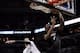 Mar 6, 2014; San Antonio, TX, USA; Miami Heat center Chris Bosh (1) shoots the ball past San Antonio Spurs guard Danny Green (4) during the first half at AT&T Center. Mandatory Credit: Soobum Im-USA TODAY Sports
