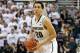 EAST LANSING, MI - MARCH 01: Travis Trice #20 of the Michigan State Spartans brings the basketball up the court during the second half of the game against the University of Illinois at the Breslin Center on March 1, 2014 in East Lansing, Michigan. Illino