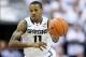 Mar 1, 2014; East Lansing, MI, USA; Michigan State Spartans guard Keith Appling (11) brings the ball up court against the Illinois Fighting Illini during the 2nd half of a game at Jack Breslin Student Events Center. Illinois won 53-46. Mandatory Credit: M