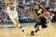 Mar 6, 2014; East Lansing, MI, USA; Iowa Hawkeyes guard Roy Devyn Marble (4) drives to the basket against Michigan State Spartans guard Denzel Valentine (45) during the 1st half of a game at Jack Breslin Student Events Center. Mandatory Credit: Mike Carte