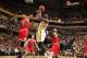 Bulls forward Taj Gibson challenges Pacers center Roy Hibbert
