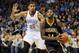 Dec 8, 2013; Oklahoma City, OK, USA; Indiana Pacers small forward Paul George (24) handles the ball against Oklahoma City Thunder shooting guard Thabo Sefolosha (25) during the second quarter at Chesapeake Energy Arena. Mandatory Credit: Mark D. Smith-USA