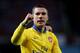 LONDON, ENGLAND - DECEMBER 26: Lukas Podolski of Arsenal celebrates victory after the Barclays Premier League match between West Ham United and Arsenal at Boleyn Ground on December 26, 2013 in London, England. (Photo by Ian Walton/Getty Images)