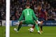 MANCHESTER, ENGLAND - FEBRUARY 18: Daniel Alves of Barcelona scores his team's second goal during the UEFA Champions League Round of 16 first leg match between Manchester City and Barcelona at the Etihad Stadium on February 18, 2014 in Manchester, Englan