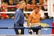 May 5, 2012; Las Vegas, NV, USA; Canelo Alvarez (right) goes to his corner to during the third round against Shane Mosley at MGM Grand Garden Arena. Mandatory Credit: Jake Roth-USA TODAY Sports