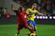 LISBON, PORTUGAL - NOVEMBER 15: Fabio Coentrao of Portugal battles with Sebastian Larsson of Sweden during the FIFA 2014 World Cup Qualifier Play-off First Leg between Portugal and Sweden at Estadio da Luz on November 15, 2013 in Lisbon, Portugal. (Phot