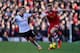 LONDON, ENGLAND - FEBRUARY 01: Luke Shaw of Southampton in action against Lewis Holtby of Fulham during the Barclays Premier League match between Fulham and Southampton at Craven Cottage on February 1, 2014 in London, England. (Photo by Ian Walton/Getty