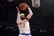Feb 7, 2014; New York, NY, USA; New York Knicks small forward Carmelo Anthony (7) grabs a rebound against the Denver Nuggets during the first half at Madison Square Garden. Mandatory Credit: Joe Camporeale-USA TODAY Sports