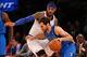 Feb 24, 2014; New York, NY, USA; Dallas Mavericks point guard Jose Calderon (8) dribbles the ball past New York Knicks small forward Carmelo Anthony (7) during the third quarter at Madison Square Garden. Dallas Mavericks won 110-108. Mandatory Credit: An