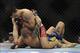 May 15, 2012; Fairfax, VA, USA; The Korean Zombie (top) lands an elbow to the temple of Dustin Poirier (bottom) during the Korean zombie vs Poirier event at Patriot Center. Mandatory Credit: Rafael Suanes-USA TODAY Sports