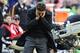 Oct 27, 2013; Washington, DC, USA; DC United head coach Ben Olsen stands on the sidelines during the second half against the Houston Dynamo at Robert F. Kennedy Memorial. Mandatory Credit: Brad Mills-USA TODAY Sports