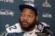 Jan 30, 2014; Jersey City, NJ, USA; Seattle Seahawks defensive end Michael Bennett (72) at a press conference at The Westin in advance of Super Bowl XLVIII. Mandatory Credit: Kirby Lee-USA TODAY Sports