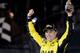 DAYTONA BEACH, FL - FEBRUARY 20: Matt Kenseth, driver of the #20 Dollar General Toyota, celebrates in Victory Lane after winning the NASCAR Sprint Cup Series Budweiser Duel 1 at Daytona International Speedway on February 20, 2014 in Daytona Beach, Florid