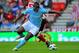SUNDERLAND, ENGLAND - AUGUST 29: Micah Richards (front) of Manchester City battles for the ball with Fraizer Campbell of Sunderland during the Barclays Premier League match between Sunderland and Manchester City at the Stadium of Light on August 29, 2010