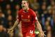 LONDON, ENGLAND - DECEMBER 15: Jordan Henderson of Liverpool celebrates scoring their second goal during the Barclays Premier League match between Tottenham Hotspur and Liverpool at White Hart Lane on December 15, 2013 in London, England. (Photo by Paul