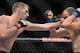 April 13, 2013; Las Vegas, NV, USA; Luke Barnatt hits Collin Hart during the TUF 17 Finale at the Mandalay Bay Events Center. Mandatory Credit: Gary A. Vasquez-USA TODAY Sports