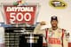DAYTONA BEACH, FL - FEBRUARY 23: Dale Earnhardt Jr., driver of the #88 National Guard Chevrolet, celebrates in Victory Lane with the the Harley J. Earl trophy after winning the NASCAR Sprint Cup Series Daytona 500 at Daytona International Speedway on Feb