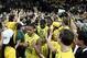 Mar 8, 2014; Eugene, OR, USA; Oregon Ducks fans rush the court as Oregon Ducks guard Joseph Young (3) and Oregon Ducks guard Damyean Dotson (21) and Oregon Ducks forward Elgin Cook (23) celebrate against the Arizona Wildcats at Matthew Knight Arena. Manda