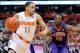 Feb 9, 2014; Syracuse, NY, USA; Syracuse Orange guard Tyler Ennis (11) dribbles the ball in front of Clemson Tigers guard Rod Hall (12) during the first half at the Carrier Dome. Mandatory Credit: Rich Barnes-USA TODAY Sports