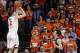 Feb 22, 2014; Charlottesville, VA, USA; Virginia Cavaliers guard Joe Harris (12) shoots the ball over Notre Dame Fighting Irish guard Steve Vasturia (32) in the first half at John Paul Jones Arena. The Cavaliers won 70-49. Mandatory Credit: Geoff Burke-US