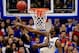 LAWRENCE, KS - JANUARY 11: Joel Embiid #21 of the Kansas Jayhawks blocks a shot by Jevon Thomas #5 of the Kansas State Wildcats during the game at Allen Fieldhouse on January 11, 2014 in Lawrence, Kansas. (Photo by Jamie Squire/Getty Images)