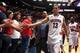 TUCSON, AZ - FEBRUARY 26: Nick Johnson #13 of the Arizona Wildcats high fives fans as he walks off the court following the college basketball game against the California Golden Bears at McKale Center on February 26, 2014 in Tucson, Arizona. The Wildcats