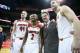 LOUISVILLE, KY - MARCH 08: Stephan Van Treese #44 , Tim Henderson #15, Russ Smith #2, Rick Pitino and Luke Hancock #11 of the Louisville Cardinals after the game against the Connecticut Huskies at KFC YUM! Center on March 8, 2014 in Louisville, Kentucky.