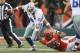 CINCINNATI, OH - DECEMBER 09: Michael Johnson #93 of the Cincinnati Bengals sacks Tony Romo #9 of the Dallas Cowboys during their game at Paul Brown Stadium on December 9, 2012 in Cincinnati, Ohio. The Cowboys defeated the Bengals 20-19. (Photo by John