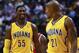 INDIANAPOLIS, IN - OCTOBER 05: Roy Hibbert #55 and David West #21 of the Indiana Pacers talk during action against the Chicago Bulls on October 5, 2013 at Bankers Life Fieldhouse in Indianapolis, Indiana. Chicago defeated Indiana 82-76. NOTE TO USER: User