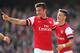 LONDON, ENGLAND - MARCH 08: Olivier Giroud of Arsenal celebrates with teammate Mesut Oezil after scoring his team's fourth goal during the FA Cup Quarter-Final match between Arsenal and Everton at Emirates Stadium on March 8, 2014 in London, England. (P