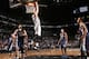 BROOKLYN, NY - MARCH 5: Mason Plumlee #1 of the Brooklyn Nets dunks against the Memphis Grizzlies at the Barclays Center on March 5, 2014 in the Brooklyn borough of New York City. NOTE TO USER: User expressly acknowledges and agrees that, by downloading