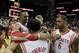 Mar 9, 2014; Houston, TX, USA; Houston Rockets center Dwight Howard (12), point guard Patrick Beverley (2), and power forward Terrence Jones (6) celebrate following the end of overtime against the Portland Trail Blazers at Toyota Center. Mandatory Credit: