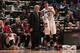 MINNEAPOLIS, MN - JANUARY 10: Rick Adelman and Kevin Love #42 of the Minnesota Timberwolves talk during the game against the Charlotte Bobcats on January 10, 2014 at Target Center in Minneapolis, Minnesota. NOTE TO USER: User expressly acknowledges and a