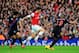 LONDON, ENGLAND - FEBRUARY 02: Olivier Giroud of Arsenal breaks forward with the ball under pressure from Mile Jedinak and Danny Gabbidon of Crystal Palace during the Barclays Premier League match between Arsenal and Crystal Palace at Emirates Stadium o