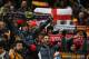 MANCHESTER, ENGLAND - FEBRUARY 18: Barcelona fans celebrate during the UEFA Champions League Round of 16 first leg match between Manchester City and Barcelona at the Etihad Stadium on February 18, 2014 in Manchester, England. (Photo by Clive Brunskill/G