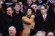 LIVERPOOL, ENGLAND - JANUARY 18: Liverpool co-owner John Henry (R) looks on with wife Linda Pizzuti, Chairman Tom Werner (L) and Kenny Dalglish prior to the Barclays Premier League match between Liverpool and Aston Villa at Anfield on January 18, 2014 in