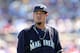 PEORIA, AZ - MARCH 09: Starting pitcher Felix Hernandez #34 of the Seattle Mariners walks to the dugout during the spring training game against the Texas Rangers at Peoria Stadium on March 9, 2014 in Peoria, Arizona. (Photo by Christian Petersen/Getty I
