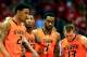 LAWRENCE, KS - JANUARY 18: Le'Bryan Nash #2, Marcus Smart #33, Brian Williams #4, and Phil Forte, III #13 of the Oklahoma State Cowboys walk back upcourt after a foul during the game against the Kansas Jayhawks at Allen Fieldhouse on January 18, 2014 in
