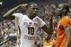 Mar 9, 2014; Tallahassee, FL, USA; Florida State Seminoles forward Okaro White (10) celebraes after a dunk over Syracuse Orange center Baye-Moussa Keita (12) during the first half at Donald L. Tucker Center. Mandatory Credit: Matt Stamey-USA TODAY Sports