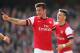 LONDON, ENGLAND - MARCH 08: Olivier Giroud of Arsenal celebrates with teammate Mesut Oezil after scoring his team's fourth goal during the FA Cup Quarter-Final match between Arsenal and Everton at Emirates Stadium on March 8, 2014 in London, England. (P