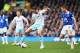 LIVERPOOL, ENGLAND - MARCH 01: Andy Carroll of West Ham United is closed down by James McCarthy of Everton during the Barclays Premier League match between Everton and West Ham United at Goodison Park on March 1, 2014 in Liverpool, England. (Photo by Ja