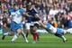 EDINBURGH, SCOTLAND - MARCH 08: Mathieu Bastareaud of France is tackled by Ryan Grant (L) and Scott Lawson during the RBS Six Nations match between Scotland and France at Murrayfield Stadium on March 8, 2014 in Edinburgh, Scotland. (Photo by David Roger