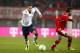 VIENNA, AUSTRIA - NOVEMBER 19: Terrence Boyd of USA (L) competes for the ball with Christian Fuchs of Austria during the International friendly match between Austria and USA at the Ernst-Happel Stadium on November 19, 2013 in Vienna, Austria. (Photo by Ch