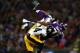 LONDON, ENGLAND - SEPTEMBER 29: Wide receiver Jerome Simpson #81 of the Minnesota Vikings is tackled by cornerback Ike Taylor #24 of the Pittsburgh Steelers during the NFL International Series game between Pittsburgh Steelers and Minnesota Vikings at Wem