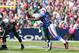 ORCHARD PARK, NY - OCTOBER 09: Arthur Moats #52 of the Buffalo Bills hits Michael Vick #7 of the Philadelphia Eagles causing Vick to throw an interception in the first half at Ralph Wilson Stadium on October 9, 2011 in Orchard Park, New York. (Photo by
