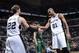 SAN ANTONIO, TX - November 20: Tiago Splitter #22 and Tim Duncan #21 of the San Antonio Spurs celebrate during the game against the Boston Celtics at the AT&T Center on November 20, 2013 in San Antonio, Texas. NOTE TO USER: User expressly acknowledges and